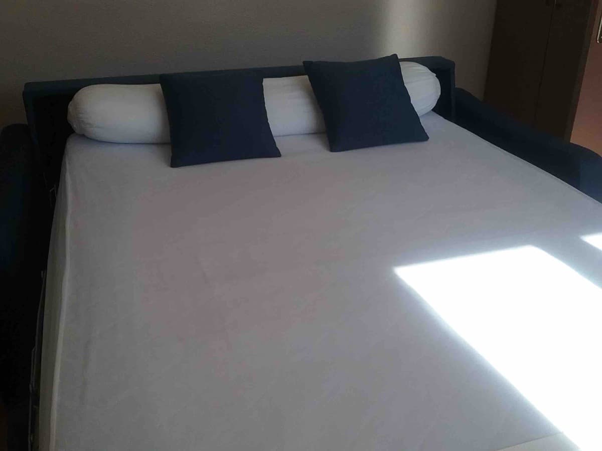 Banquette clic-clac salon Bossuet — couchage 2 personnes