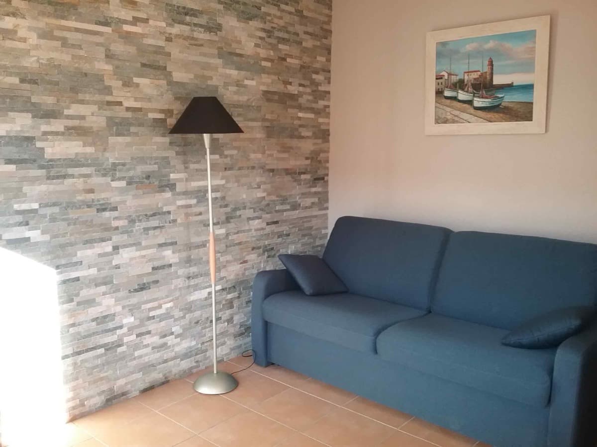 Salon pavillon Bossuet — location vacances Saint-Cyprien-Plage