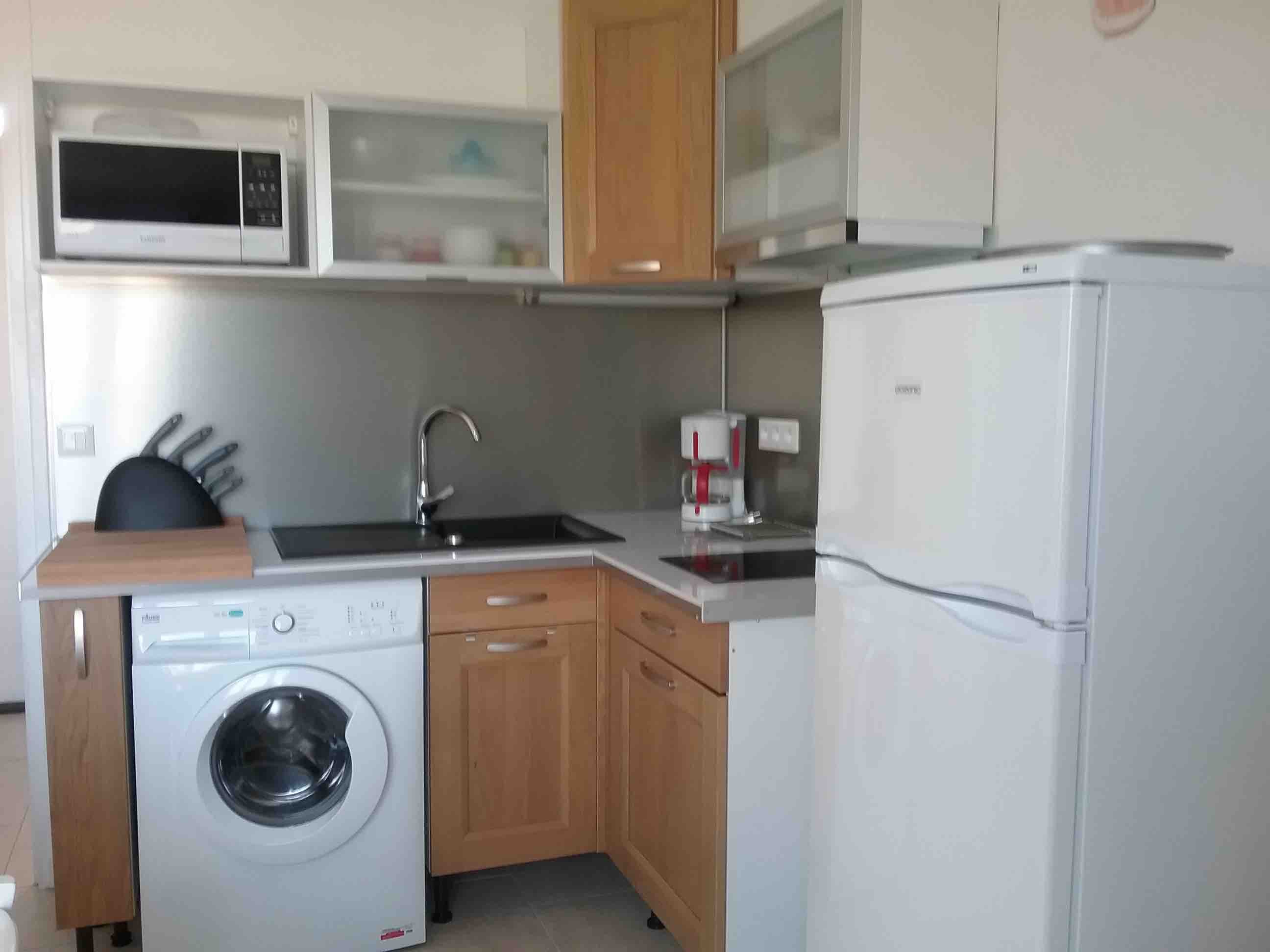 Cuisine toute équipée appartement bord de mer